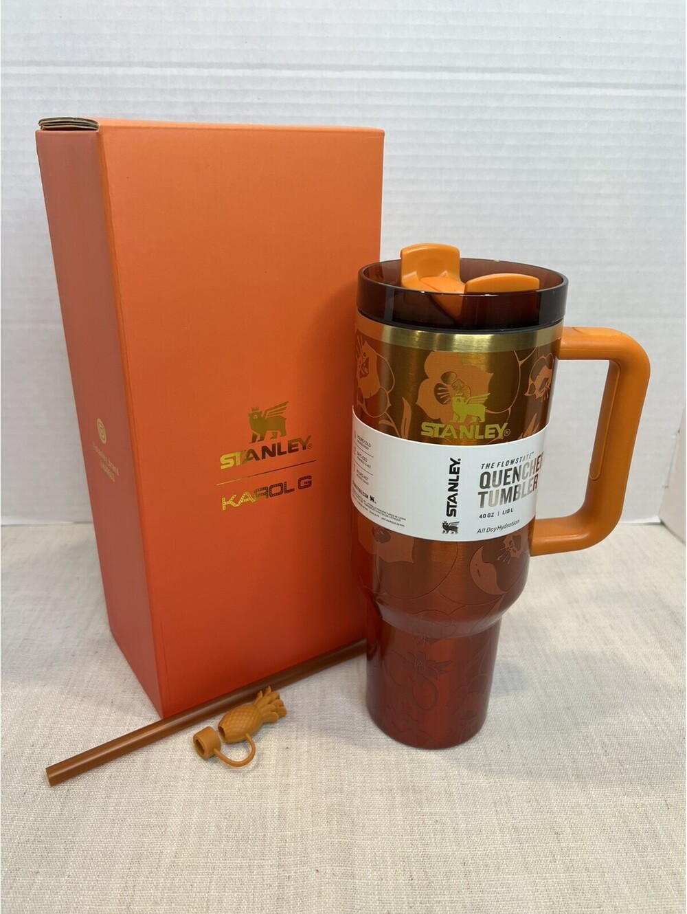 The Stanley 1913 x KAROL G 40 oz Quencher H2.O FlowState Tumbler